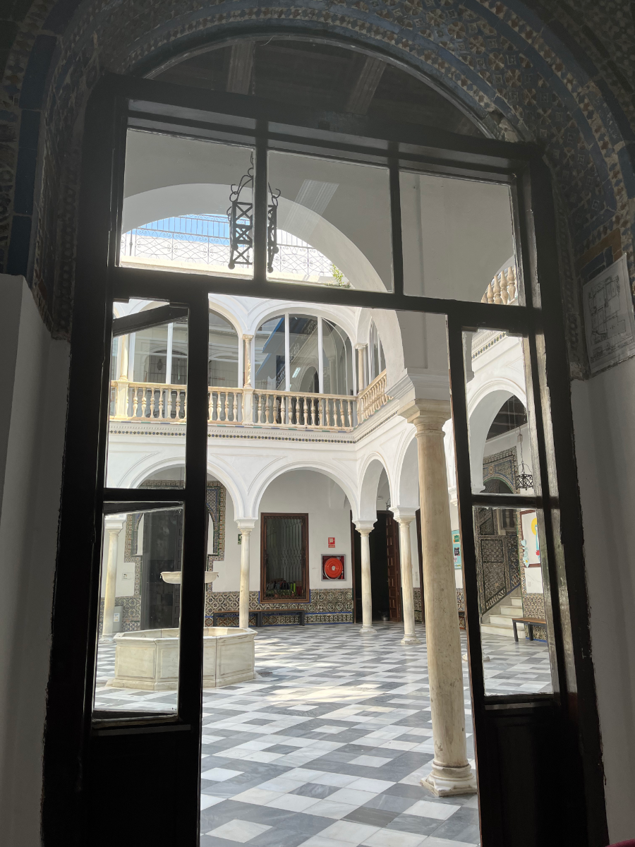 An azulejo-tiled patio in a Seville school